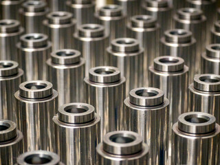 Precision metal components arranged neatly in a manufacturing facility showing intricate engineering processes