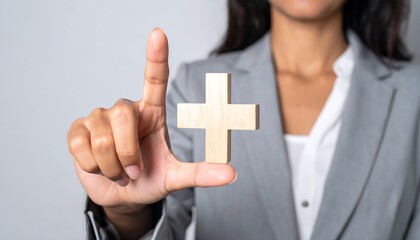 Woman hand reaching wooden plus sign icon symbolizing opportunity and positive growth