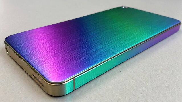 Beautiful anodized aluminum showcasing vibrant color shifts in a sleek design on a modern device