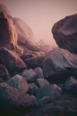A serene landscape of large, dark rocks filling the frame, bathed in a soft, hazy, pinkish light at dawn or dusk, creating a sense of calm and solitude
