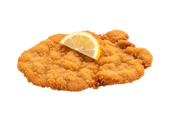 Crispy, golden-brown breaded cutlet, garnished with a lemon slice, presented against a black background.