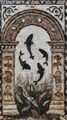 A stone mosaic depicting four stylized fish swimming within an arched alcove framed by classical columns and floral motifs