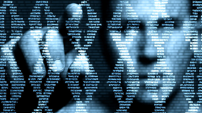 Hand interacting with digital code on a screen, symbolizing technology and data manipulation - Powered by Adobe