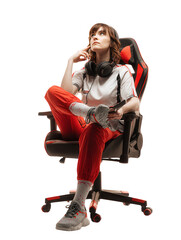 Young woman gamer sitting in a gaming chair, isolated on transparent background