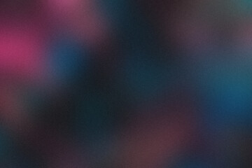Abstract bokeh lights in deep moody colors creating a vibrant, dreamy atmosphere.