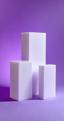 Three white cube display stands on a purple background