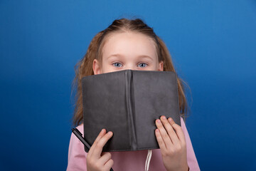 Curious Girl with Notebook