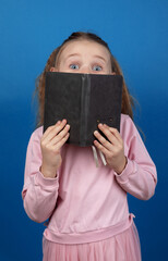Surprised Girl with Book
