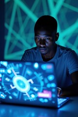 Man working on a laptop with a futuristic glowing screen interface