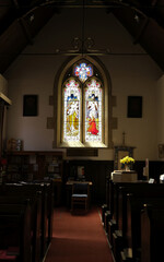 Stained Glass and Pews in Saint Blasius Church, Shanklin.
