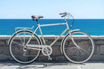 Fototapeta premium vintage bicycle parked near sea wall. Travel and summer vacation