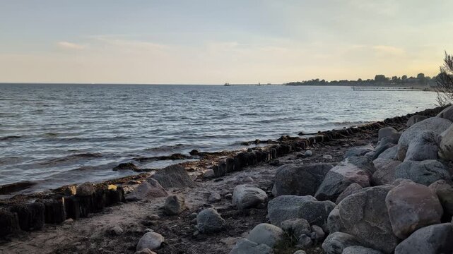 scenic view of baltic sea and shore near Kellenhusen, Germany on sunny day