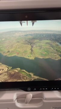 View from the monitor at the moment of landing of the plane in real time