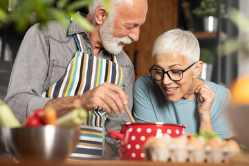 Senior couple cooking together