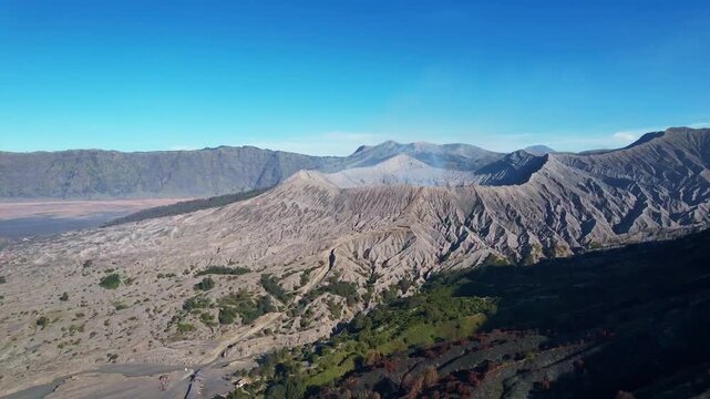 Mount Bromo under clear sky, showcasing the active volcano in East Java