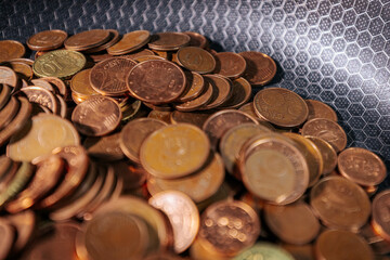 A frying pan filled with euro cent coins, symbolizing money, savings, financial struggles, or the concept of cooking up wealth and economic value.