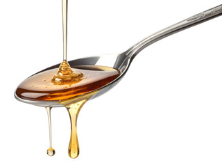 honey dripping from spoon