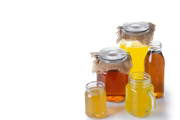 Colorful Kombucha Jars and Bottles isolated on white background. Copy space