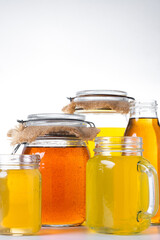 Colorful Kombucha Jars and Bottles isolated on white background