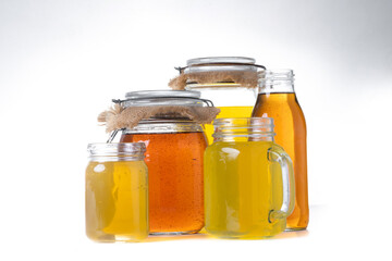 Colorful Kombucha Jars and Bottles isolated on white background