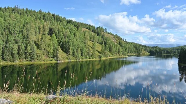 Incredible landscape of Lake Uchkel on a beautiful sunny day in Altai Republic, Russia
