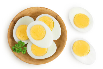 Boiled chicken egg in wooden bowl isolated on white background. Top view. Flat lay
