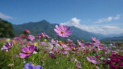 Blossoming Meadow: A vibrant field of wildflowers dances gently in the sunlight, under a cerulean sky. The backdrop features majestic mountains, creating a harmonious blend of nature's beauty.