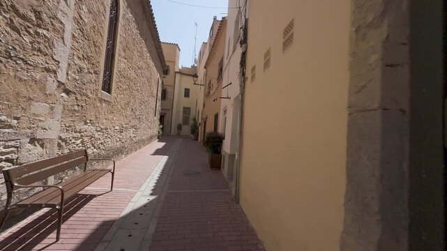 Walking through a narrow old european town alley