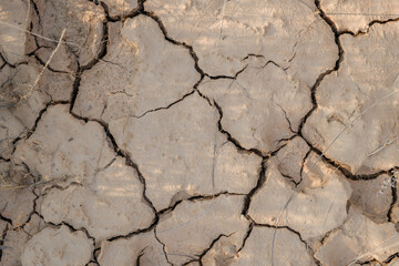 Cracked Dry Earth in a Desert Landscape Showing Severe Drought Conditions. Polygonal Soil Patterns, Climate Change Impact, Arid Environment, Warming