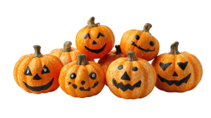Group of smiling Jack-o-lantern pumpkins with goofy faces, isolated on transparent background 