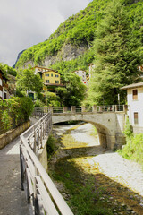 Fototapeta premium A path along a stream in Valstagna, Veneto, Italy