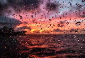 Rainy Sunset Over Ocean View Through Window.