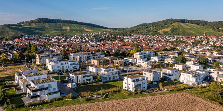 Aerial view of modern housing development with photovoltaic systems in Korb