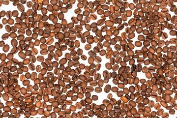 Freshly roasted coffee beans isolated on white background. coffee texture close-up, top view.