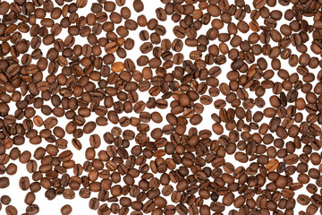 Freshly roasted coffee beans isolated on white background. coffee texture close-up, top view.