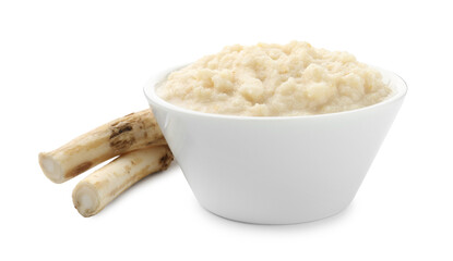 Tasty horseradish sauce in bowl and roots isolated on white