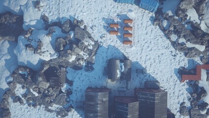 A remote winter settlement is nestled among snowy terrains and rugged rocks.
