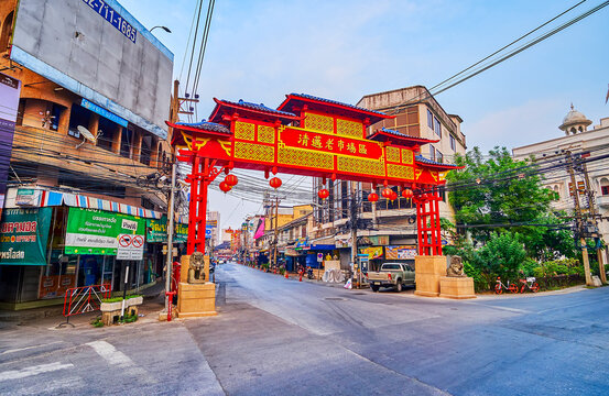The empty street with Chinese Welcome Gate, Chinatown, on May 3 in Chiang Mai, Thailand