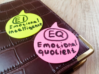 IQ EQ, emotional intelligence, emotional quotient inscription, text on colored sheets of paper on a notebook, IQ EQ concept, psycho-emotional state management.