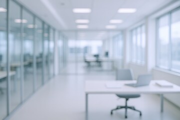 Blurred Modern Office Space with Glass Walls and Natural Light, Ideal for Backgrounds and Overlays