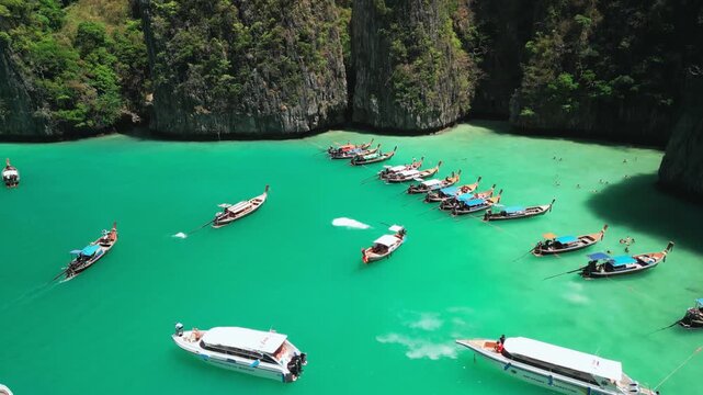 Aerial View Of Boats Anchored In Crystal Clear Lagoon Of Phi Phi Islands