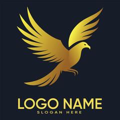 Elegant golden eagle bird logo design with wings spread wide on dark background