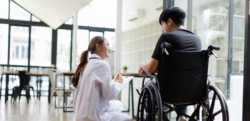 Cropped shot of a female nurse hold her man hand. Giving Support. Doctor helping man with Alzheimer's disease. Female carer holding hands of man
