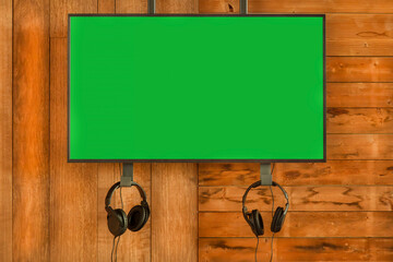 New modern digital presentation screen with chromakey copy space and headphones