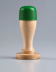 Wooden stamp with green cap