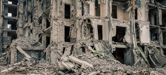 ruined street and destroyed houses the city Kiev war in Ukraine