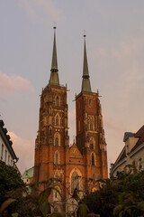Obraz premium Cathedral of St. John the Baptist on the Odra River waterfront in Wrocław