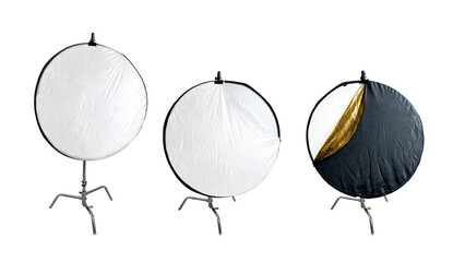 Collection set of silver collapsible reflectors on a stand isolated over a white background
