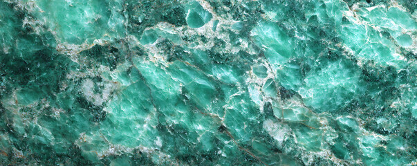 Fototapeta premium Macro shot of a vibrant green and white marble texture, abstract background