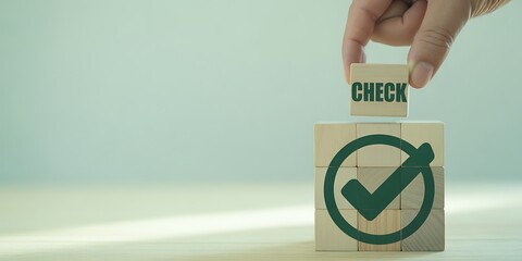 Verification process shown with wooden blocks symbolizing approval and confirmation depicting quality control and successful task completion highlighting efficiency and positive affirmation